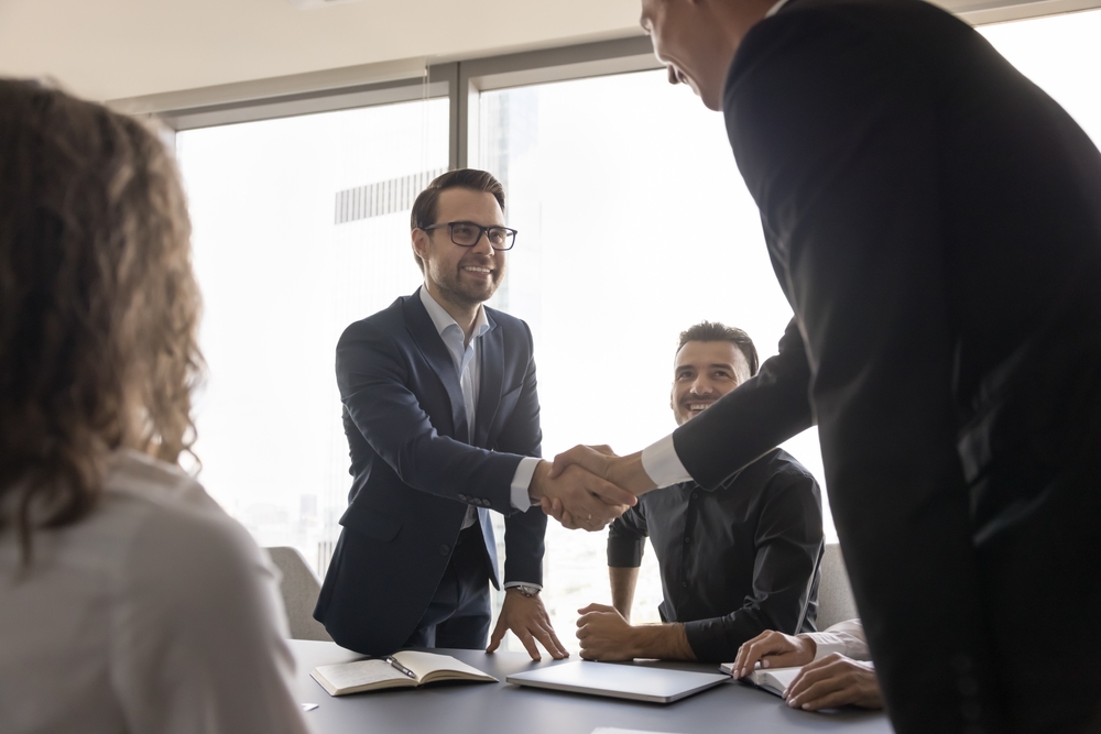 Happy successful businessmen handshake, make commercial deal, fulfill obligations, agreement between parties, integrity and reliability